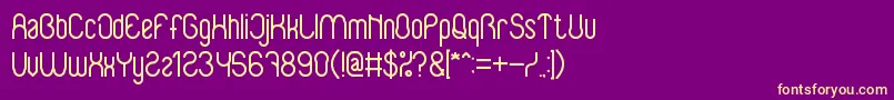 BabySuperhero-Schriftart – Gelbe Schriften auf violettem Hintergrund