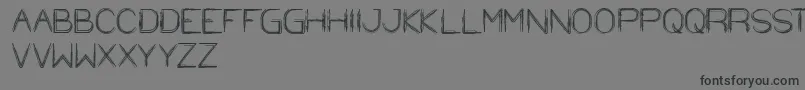 StrawHat-Schriftart – Schwarze Schriften auf grauem Hintergrund