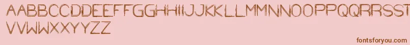 フォントStrawHat – ピンクの背景に茶色のフォント