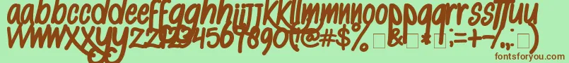 AlKisah Font – Brown Fonts on Green Background