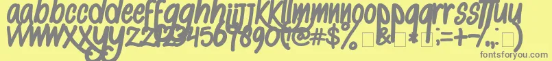 フォントAlKisah – 黄色の背景に灰色の文字
