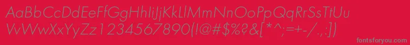FuturalightcItalic-Schriftart – Graue Schriften auf rotem Hintergrund
