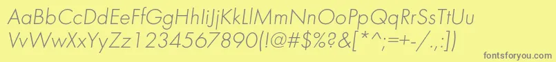 Fonte FuturalightcItalic – fontes cinzas em um fundo amarelo