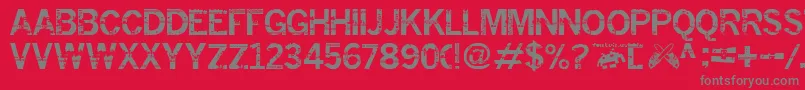 フォントInsomnesia.Fontvir.Us – 赤い背景に灰色の文字