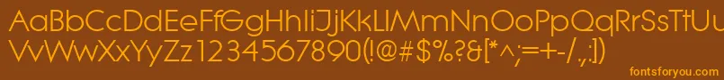 フォントLiteraRegular – オレンジ色の文字が茶色の背景にあります。