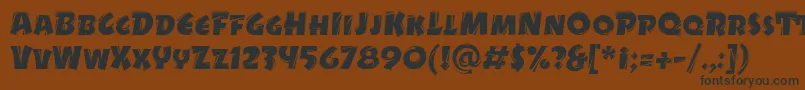 Czcionka DrycutitcTt – czarne czcionki na brązowym tle