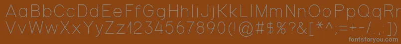 Gondola-fontti – harmaat kirjasimet ruskealla taustalla