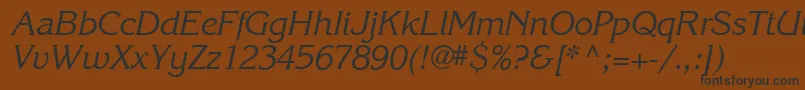 Karlajohnson5Cursivesh-fontti – mustat fontit ruskealla taustalla