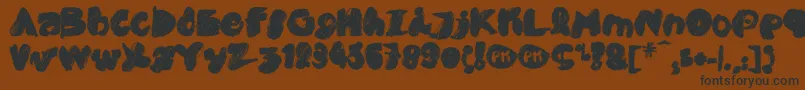 PkCobra Font – Black Fonts on Brown Background