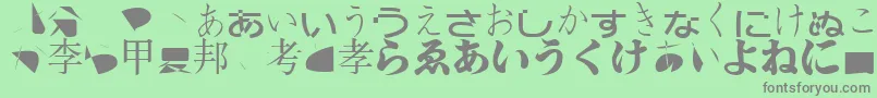 フォントBmugasianfont – 緑の背景に灰色の文字