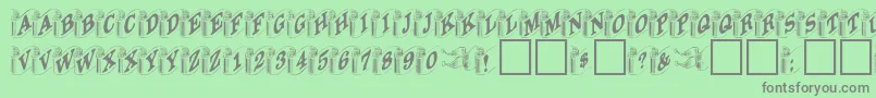 DanielRegular Font – Gray Fonts on Green Background