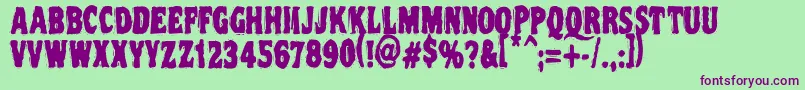 Vtc Nightoftheooziedeadcaps-Schriftart – Violette Schriften auf grünem Hintergrund