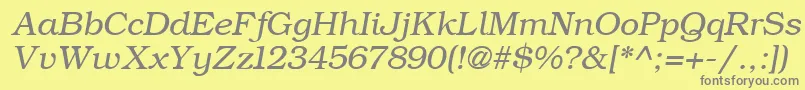 Czcionka ErBukinistKoi8Italic – szare czcionki na żółtym tle
