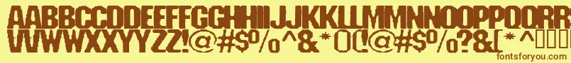 フォントFanatika – 茶色の文字が黄色の背景にあります。