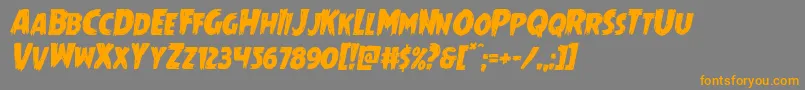 フォントMrsmonsterital – オレンジの文字は灰色の背景にあります。