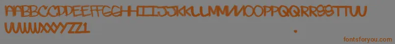 Skratchie Font – Brown Fonts on Gray Background