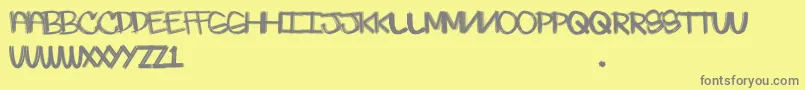 Skratchie Font – Gray Fonts on Yellow Background