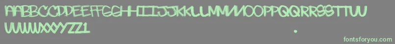 Skratchie Font – Green Fonts on Gray Background