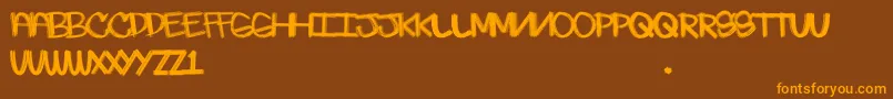 Skratchie Font – Orange Fonts on Brown Background