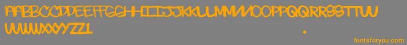 Skratchie Font – Orange Fonts on Gray Background