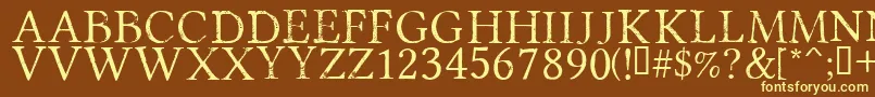 PortmanteauRegular-fontti – keltaiset fontit ruskealla taustalla