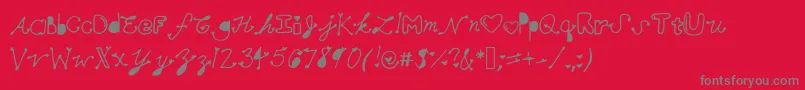 フォントMollymfont – 赤い背景に灰色の文字