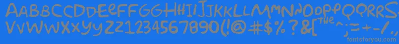 フォントSimpsonfont – 青い背景に灰色の文字