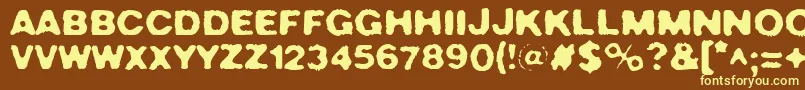 Crush49-fontti – keltaiset fontit ruskealla taustalla