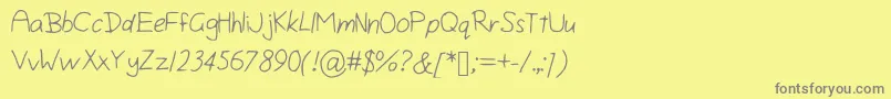 Isiniscript Font – Gray Fonts on Yellow Background