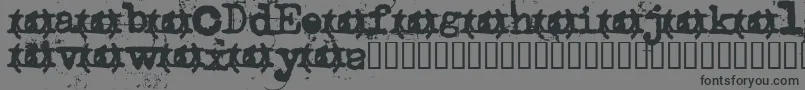 Uncletypewriter Font – Black Fonts on Gray Background