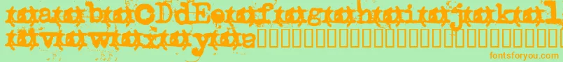 Uncletypewriter-Schriftart – Orangefarbene Schriften auf grünem Hintergrund