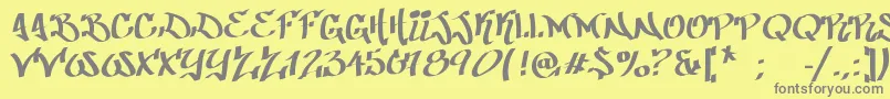 PatinioGraffiti-Schriftart – Graue Schriften auf gelbem Hintergrund