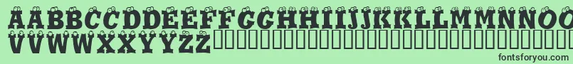 Eyesis Font – Black Fonts on Green Background