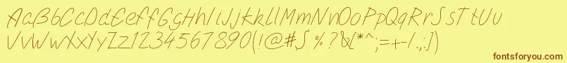 フォントPwsimplescript – 茶色の文字が黄色の背景にあります。