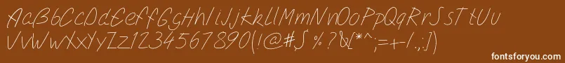 Pwsimplescript-fontti – valkoiset fontit ruskealla taustalla