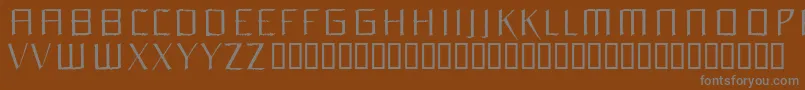 フォントOrchl – 茶色の背景に灰色の文字