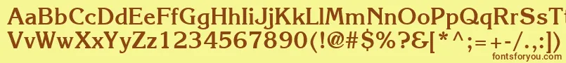 フォントItcKorinnaLtBold – 茶色の文字が黄色の背景にあります。