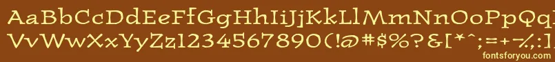 Westernpressexpandedssk-fontti – keltaiset fontit ruskealla taustalla