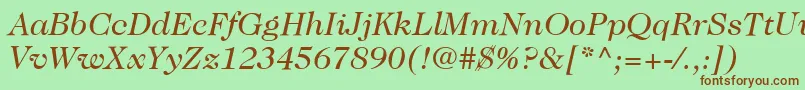 Fonte ItcCaslon224LtBookItalic – fontes marrons em um fundo verde