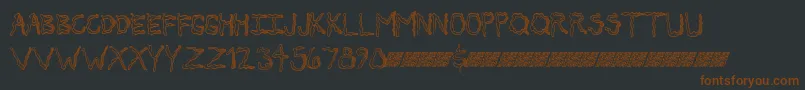 Secretticklemb Font – Brown Fonts on Black Background