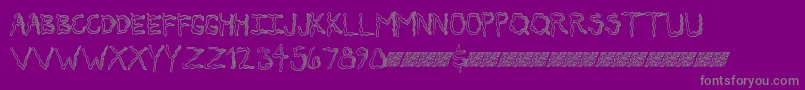 Secretticklemb-Schriftart – Graue Schriften auf violettem Hintergrund