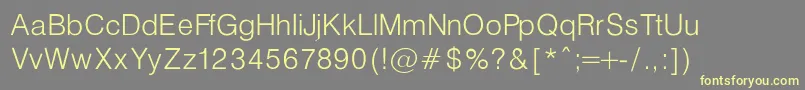 HelveticaLightNormalRegular-fontti – keltaiset fontit harmaalla taustalla