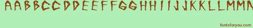 JuanjoSHotLegsBold-fontti – ruskeat fontit vihreällä taustalla