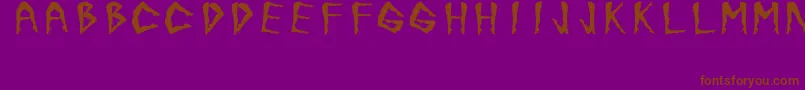 Czcionka JuanjoSHotLegsBold – brązowe czcionki na fioletowym tle