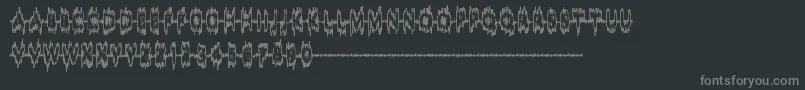 SoundSample-fontti – harmaat kirjasimet mustalla taustalla