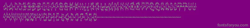 SoundSample-fontti – harmaat kirjasimet violetilla taustalla