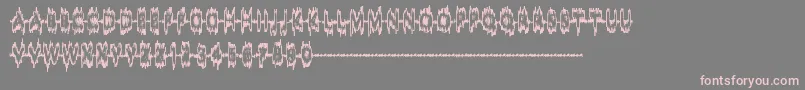 SoundSample-Schriftart – Rosa Schriften auf grauem Hintergrund