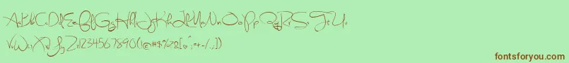 Fonte BmdSweetlyBrokenRegular – fontes marrons em um fundo verde