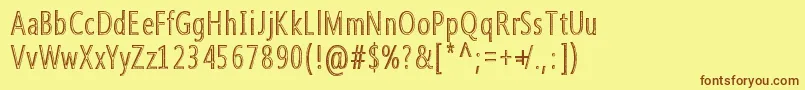 Qoncrete Font – Brown Fonts on Yellow Background