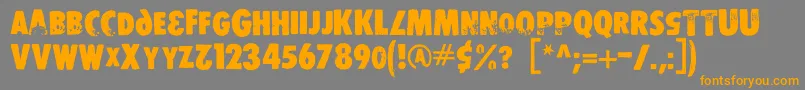 Ds Stamper Font – Orange Fonts on Gray Background